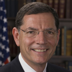 Black and white headshot of Wyoming Republican Senate candidate John Barrasso not supported by Senate Majority PAC.