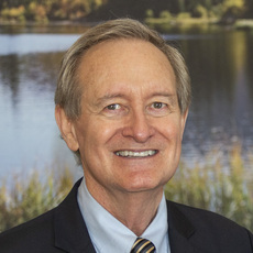 Black and white headshot of Idaho Republican Senate candidate Mike Crapo not supported by Senate Majority PAC.