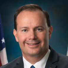 Black and white headshot of Utah Republican Senate candidate Mike Lee not supported by Senate Majority PAC.